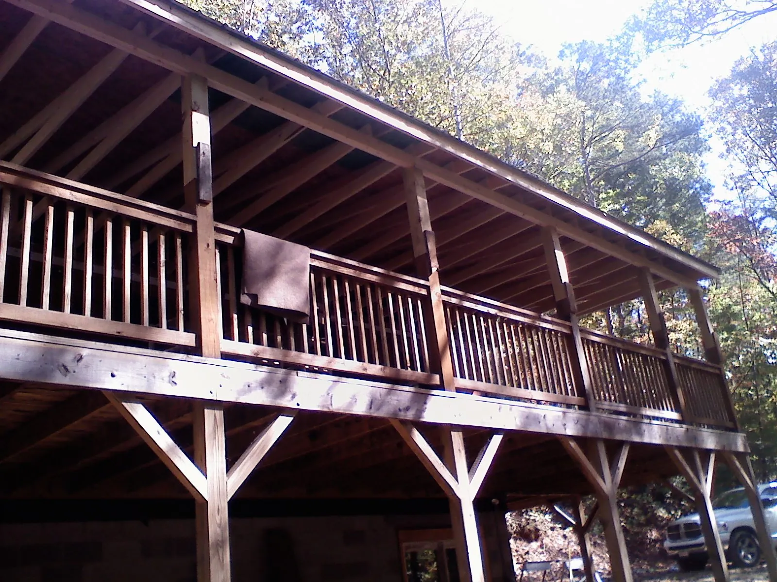 Timber framing under a new elevated porch and deck — Roof Leak Repair in Senecaville by Roofing Brothers